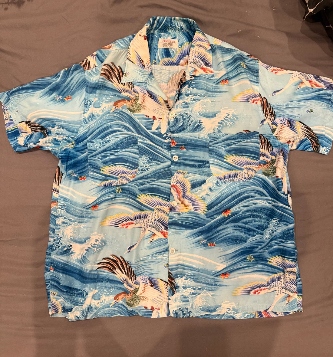 Full front — camp collar, two patch pockets, button front